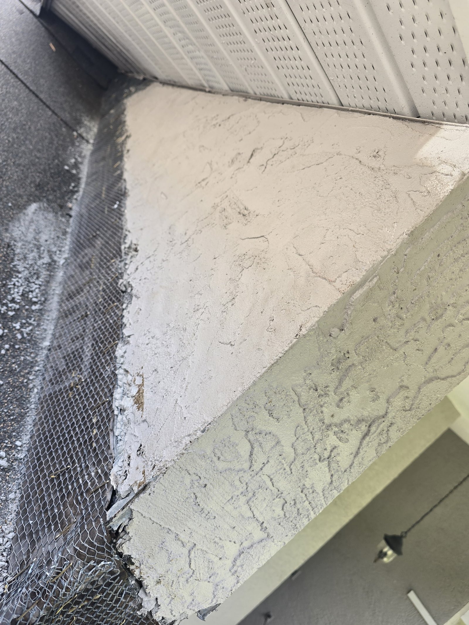 Roof-to-Wall Stucco Patch & Flashing Tie-In